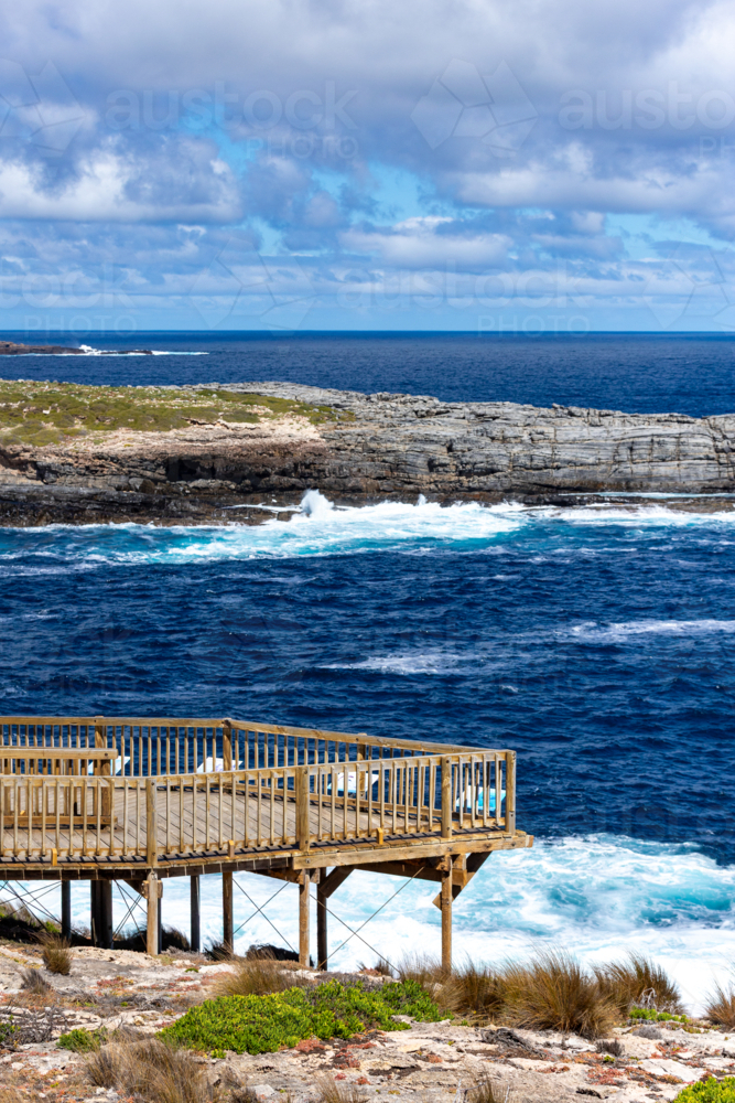 Wooden Viewing Platform at Admirals Arch Overlooking Crashing Waves, Kangaroo Island - Australian Stock Image