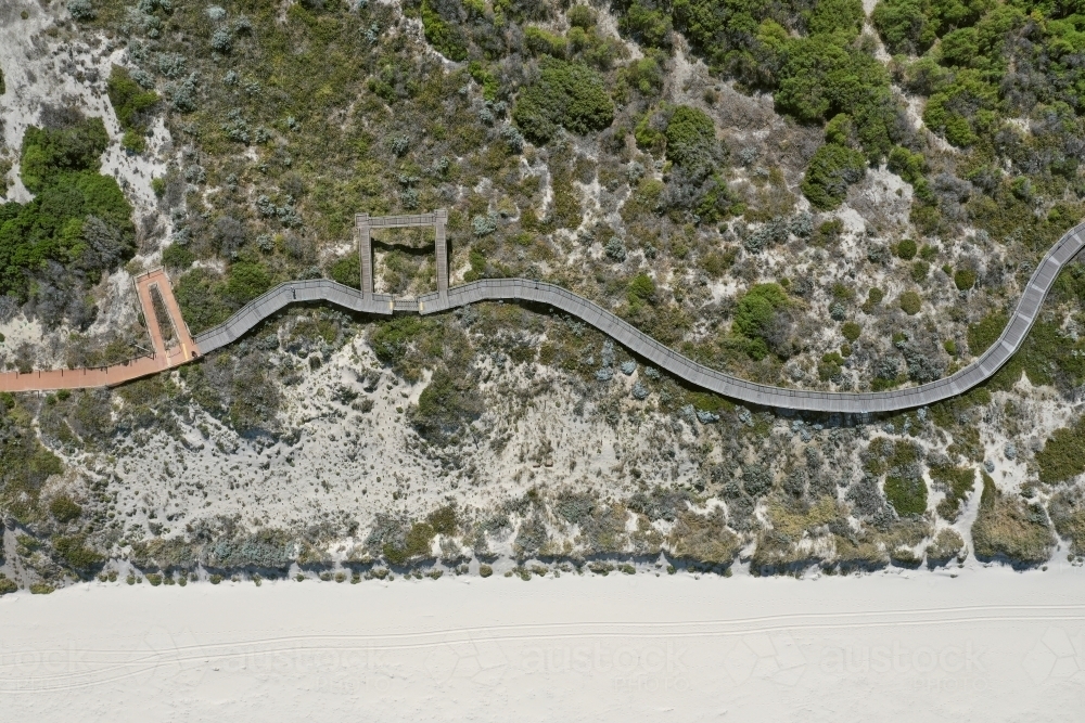 Wooden walkway over dunes next to a Perth beach. - Australian Stock Image