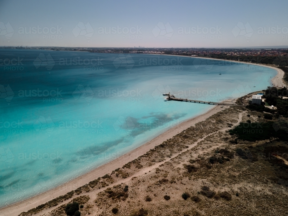 Aerial image of Woodman Point jutting out into clear blue ocean - Australian Stock Image