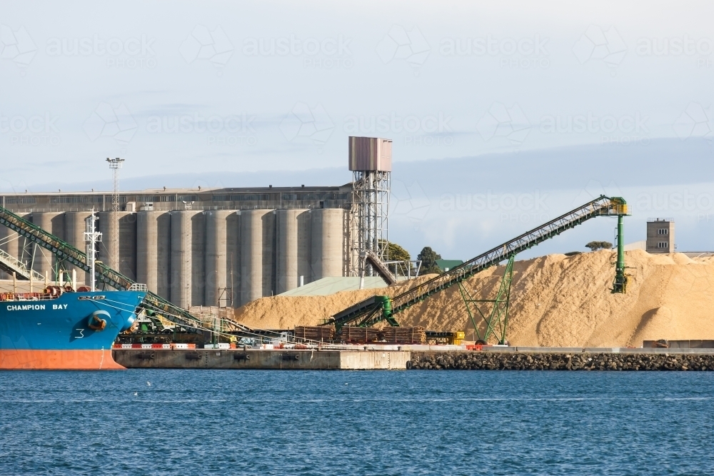 Working port and machinery with silos in background - Australian Stock Image