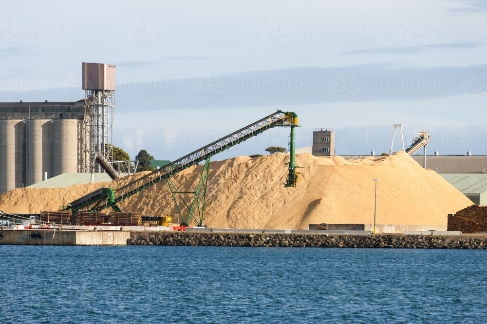 Working port and machinery with silos in background - Australian Stock Image