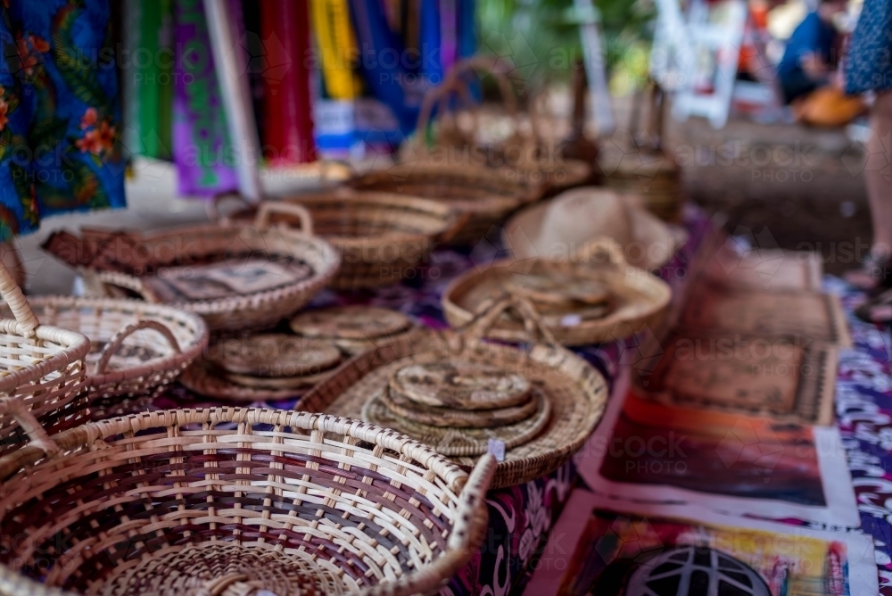 Woven baskets in market stall - Australian Stock Image