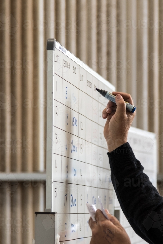 Writing on a whiteboard in a shed - Australian Stock Image