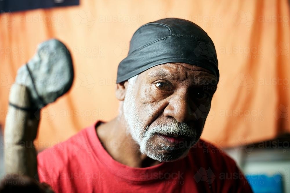 Wurundjeri Aboriginal Elder on Orange Background - Australian Stock Image