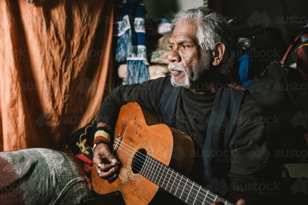 Wurundjeri Elder Playing Guitar - Australian Stock Image