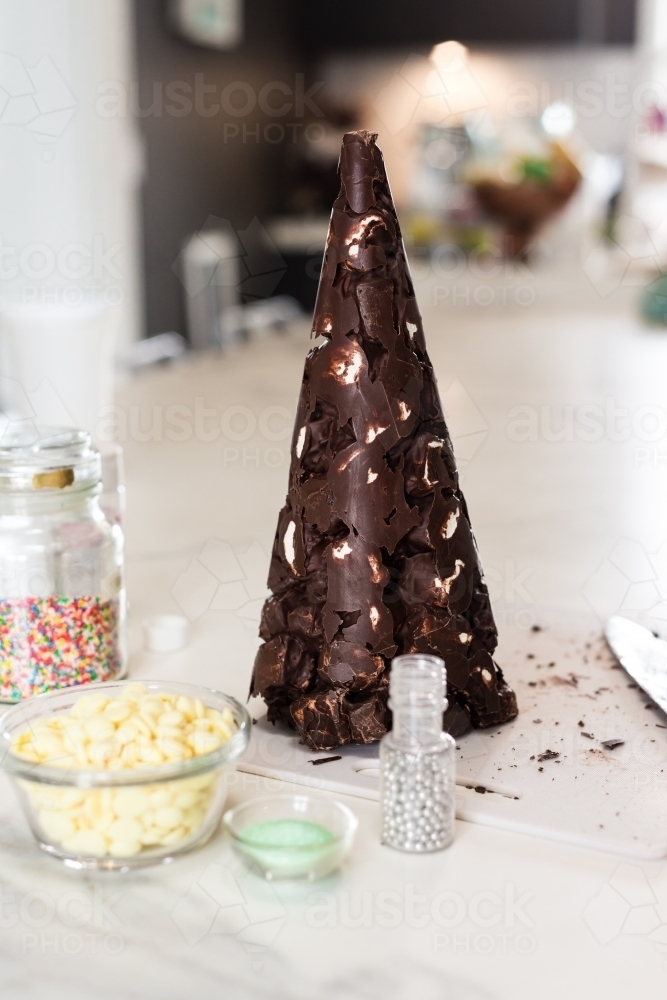 Xmas Tree rocky road removed from mould to decorate - Australian Stock Image