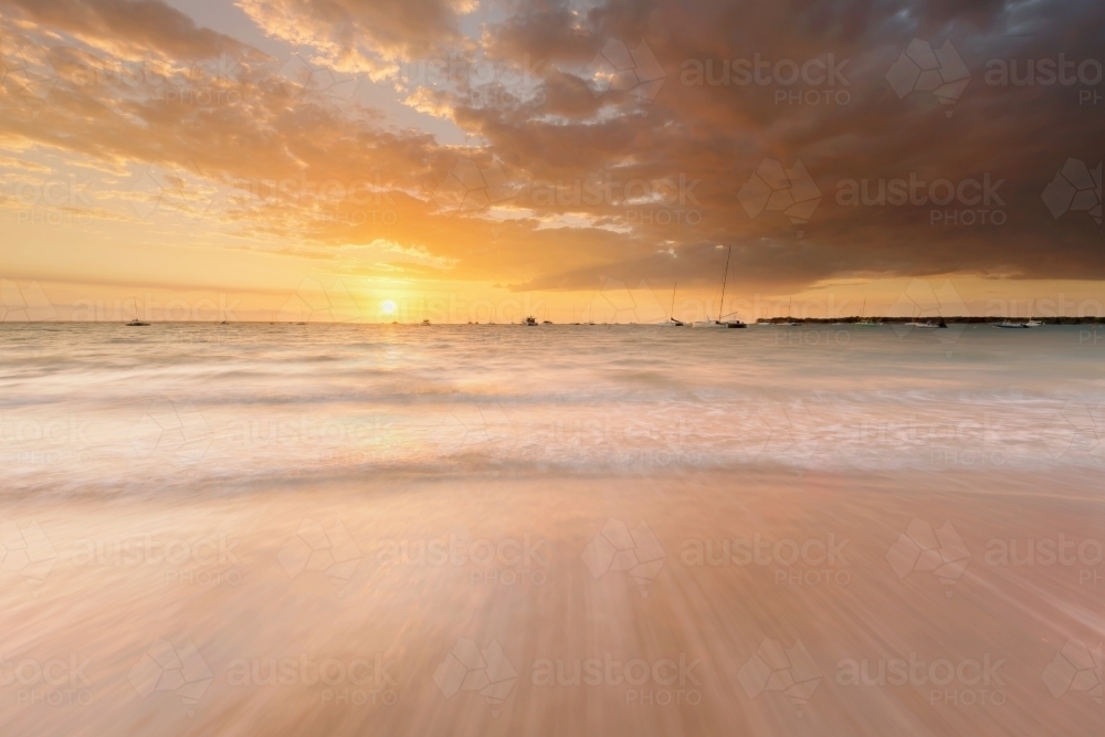 Yachts against a Fannie Bay sunset, Darwin - Australian Stock Image
