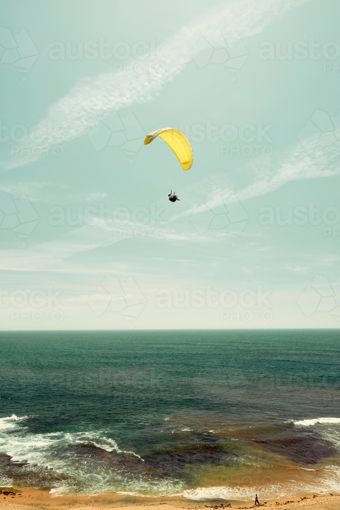 Yellow parachute on the coast with a horizon - Australian Stock Image