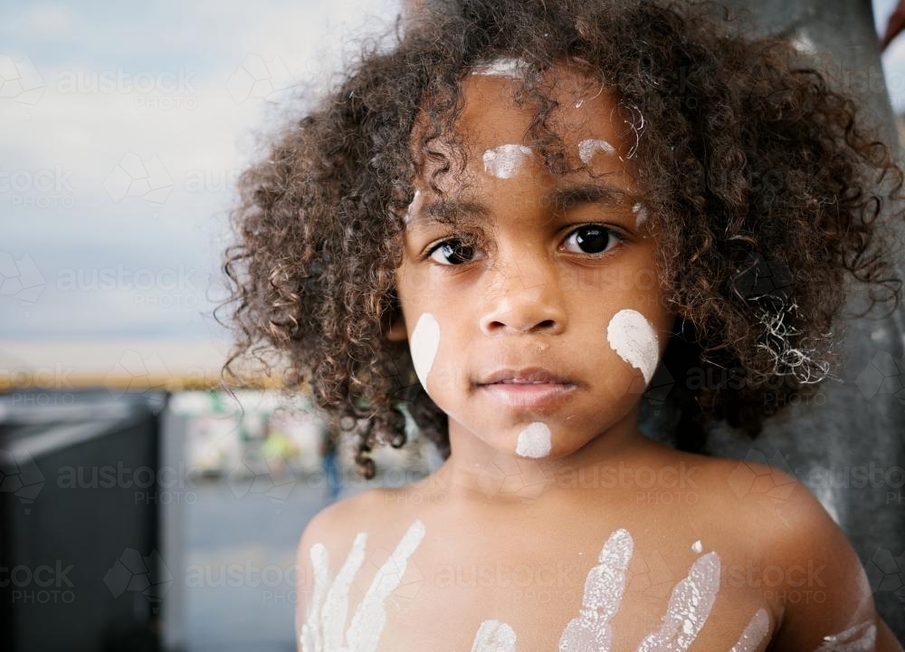 Young Aboriginal Boy with Traditional Body Paint - Australian Stock Image