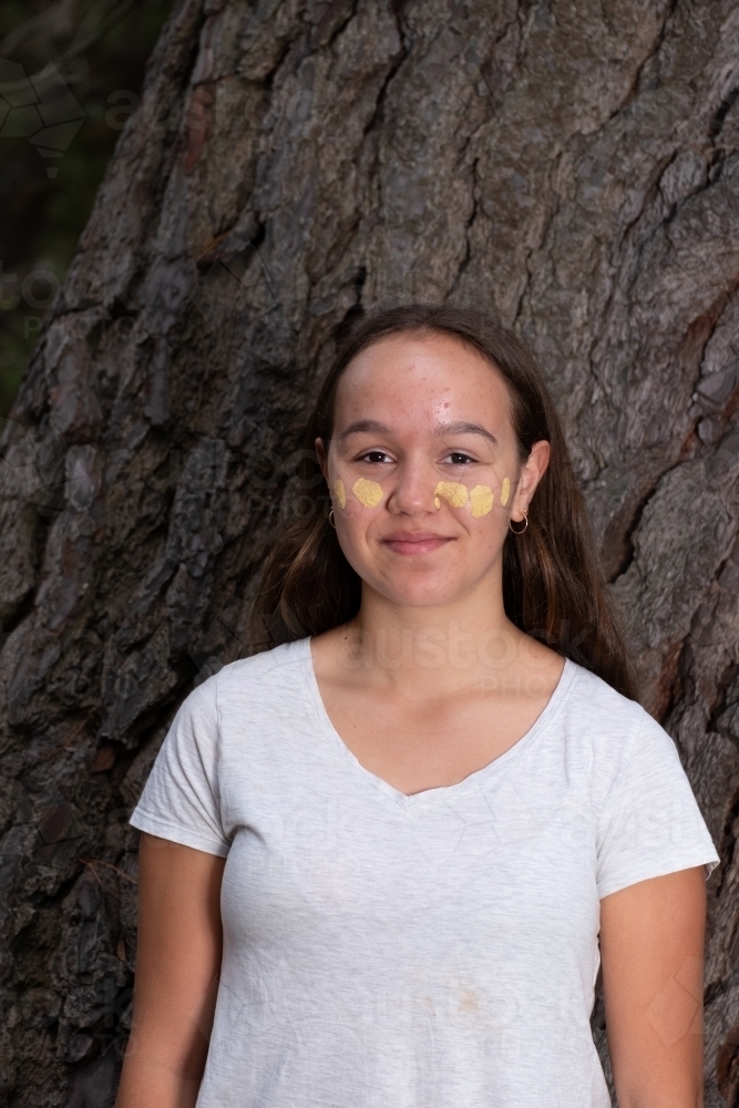 Young Aboriginal Girl in Traditonal paint - Australian Stock Image