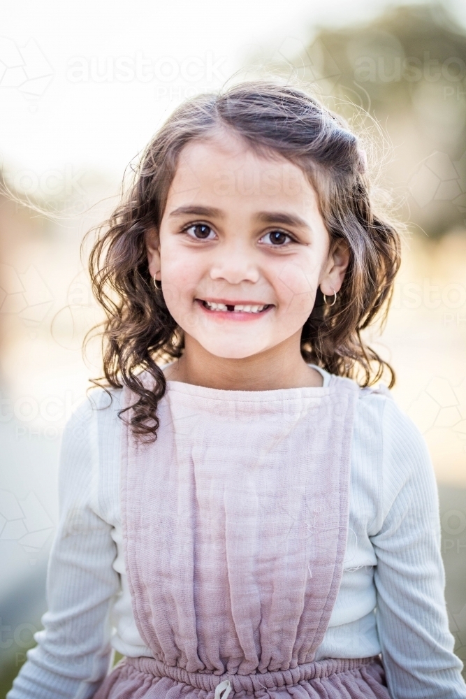 Young aboriginal girl smiling - Australian Stock Image
