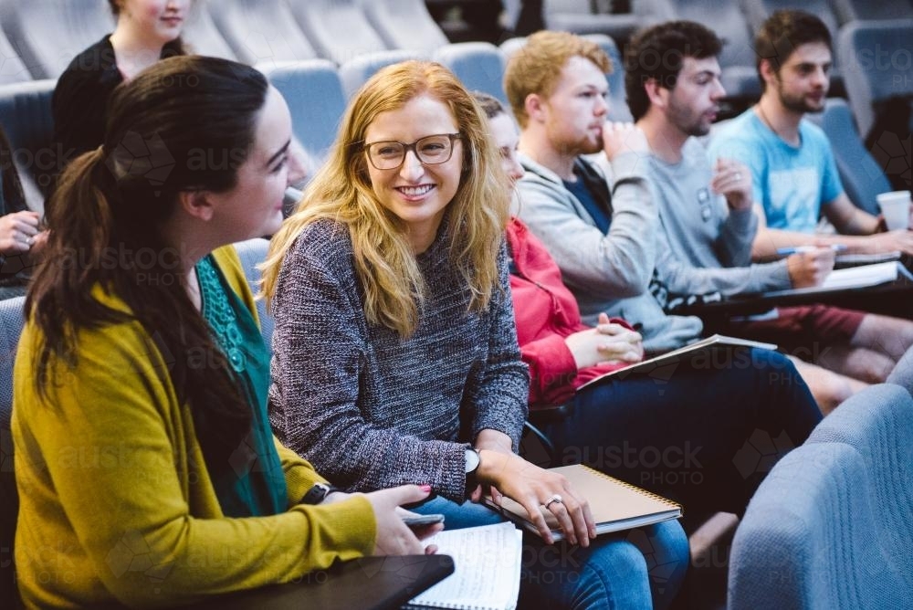 Young adult students in a university lecture hall - Australian Stock Image