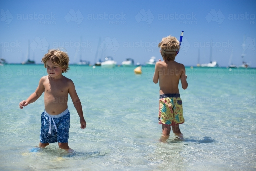 Young boys playing at beach - Australian Stock Image