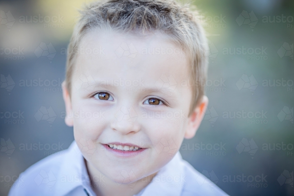 Young caucasian boy smiling - Australian Stock Image