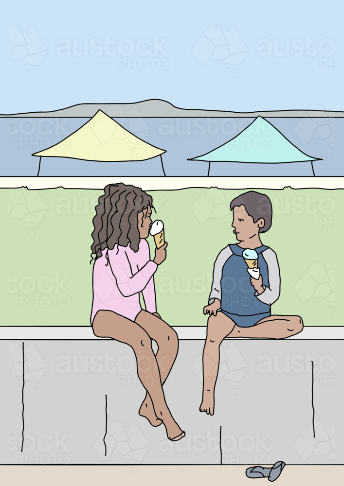 Young children sitting on wall eating ice cream in cones near the beach - Australian Stock Image