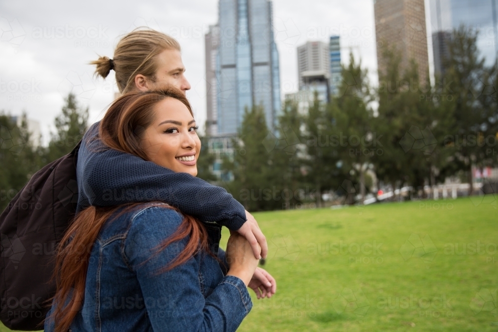 Young Couple Enjoying Melbourne Park - Australian Stock Image
