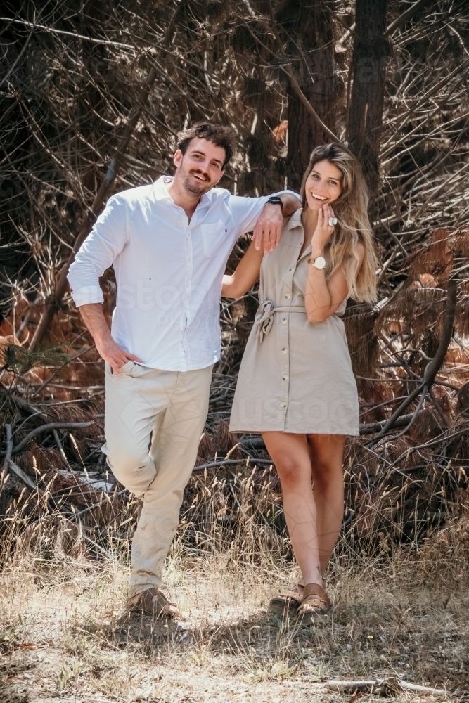 Young couple outdoors in forrest. - Australian Stock Image