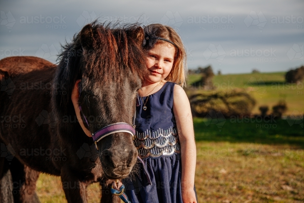 Young girl and her Pony - Australian Stock Image