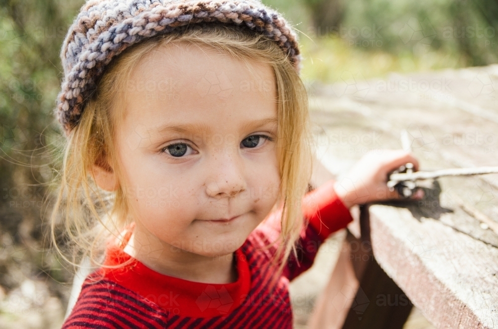 Young girl at a picnic table - Australian Stock Image