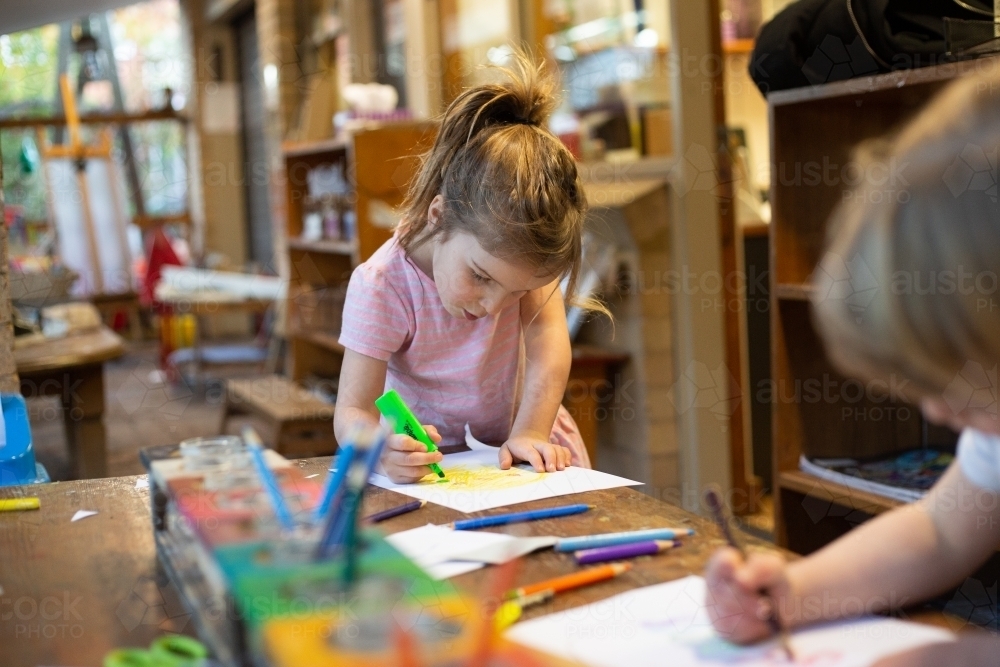 Young girl at pre-school, drawing - Australian Stock Image