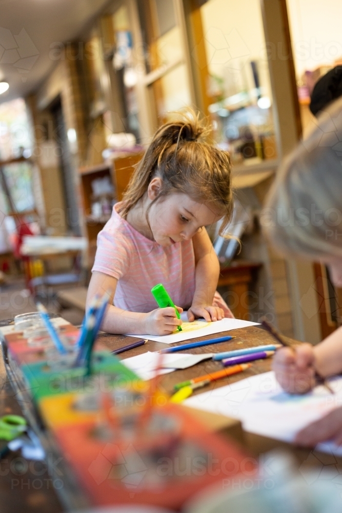 Young girl at pre-school, drawing - Australian Stock Image