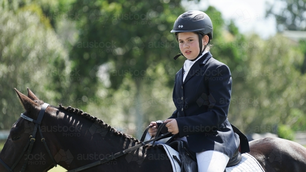 Young girl competing in horse trials - Australian Stock Image