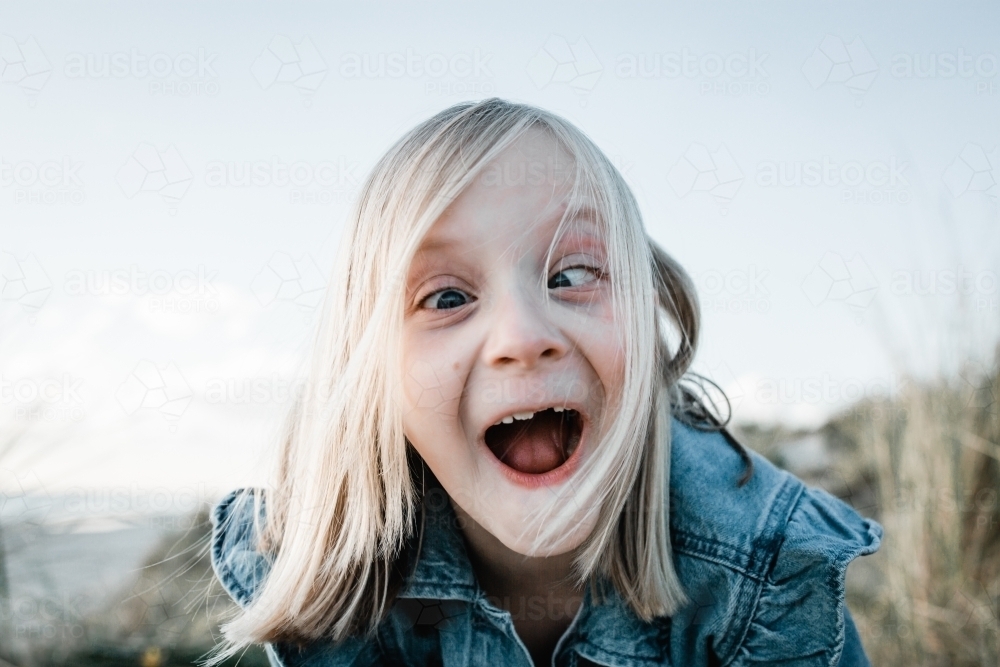 Young girl doing a funny face - Australian Stock Image