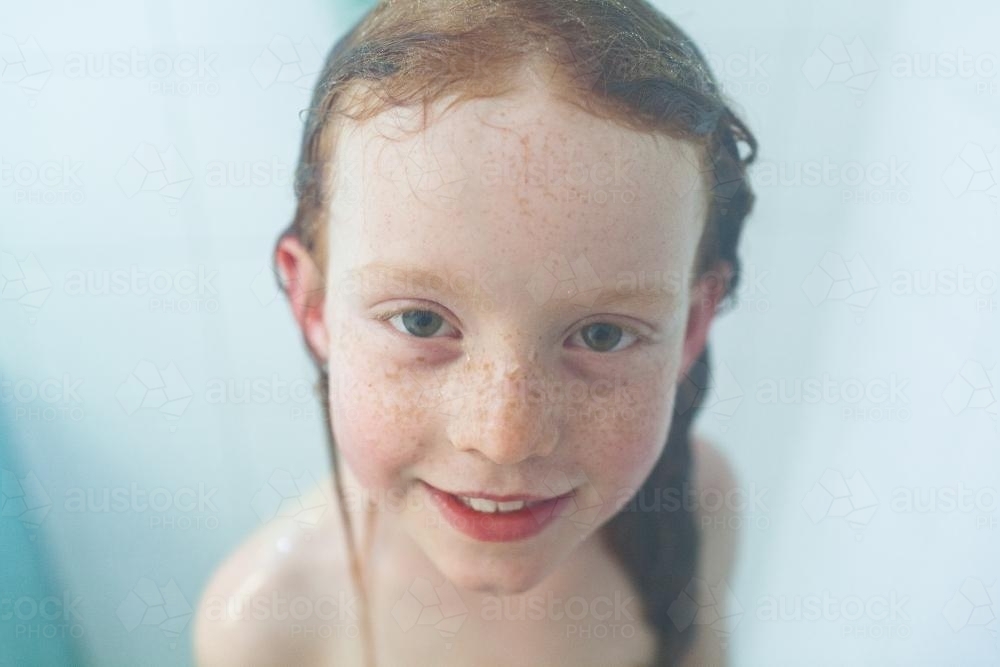 Young girl in the shower - Australian Stock Image