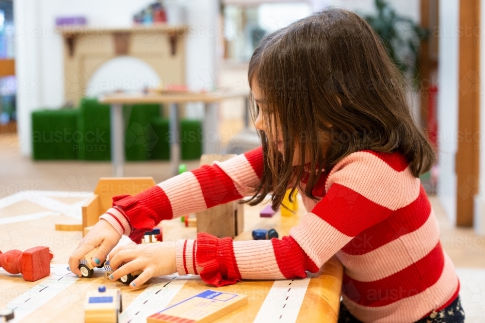 Young girl learning at pre-school - Australian Stock Image