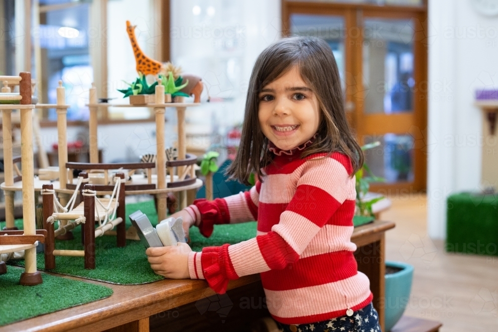 Young girl learning at pre-school - Australian Stock Image