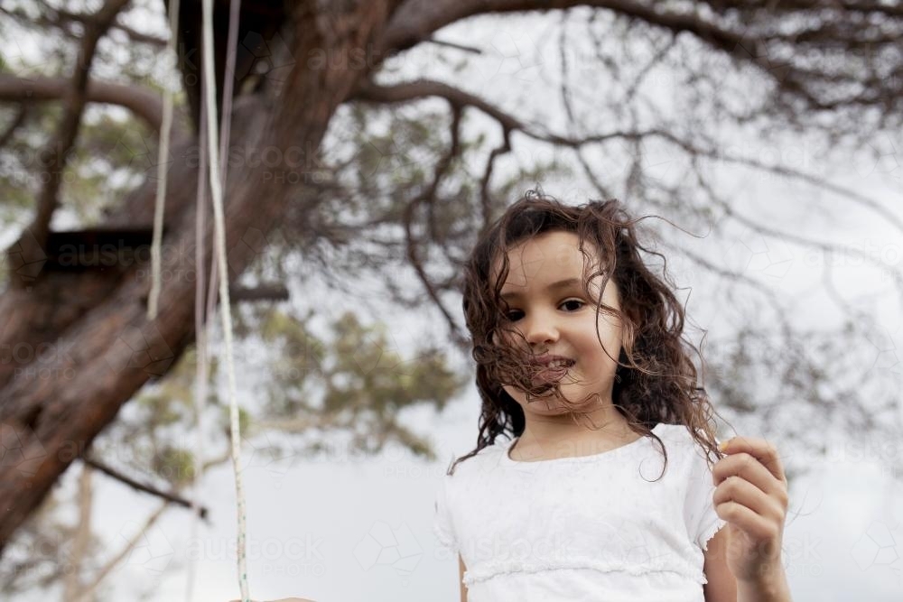 Young girl playing outside - Australian Stock Image