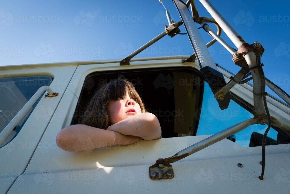 Young girl waiting in truck - Australian Stock Image