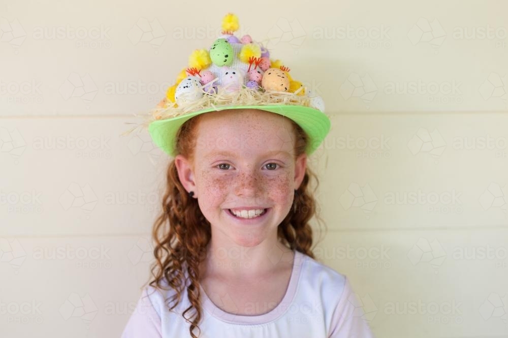 Young girl wearing an Easter hat - Australian Stock Image