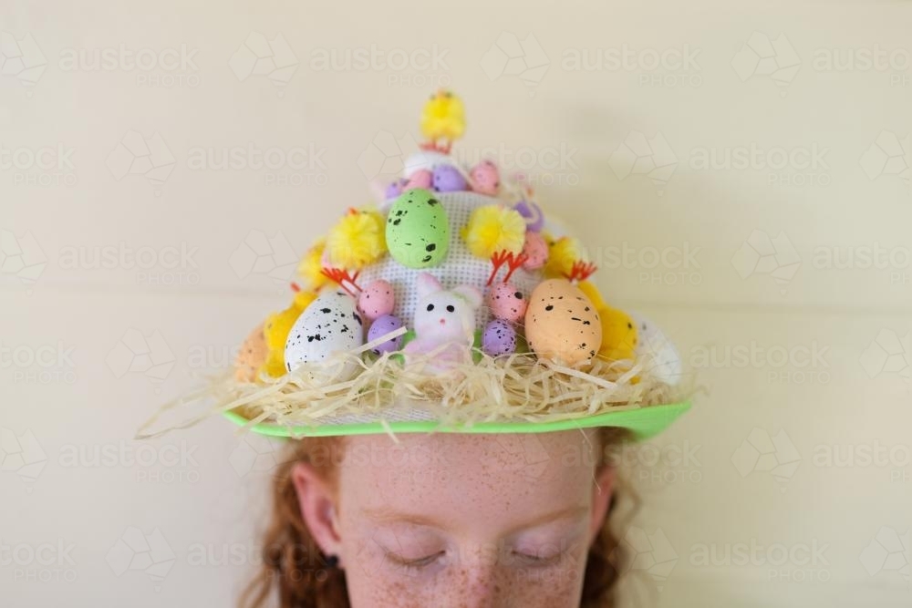 Young girl wearing an Easter hat - Australian Stock Image