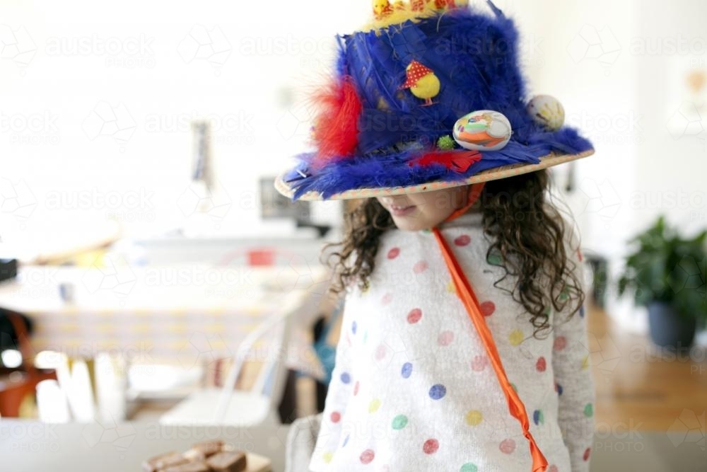 Young girl wearing hand made Easter hat - Australian Stock Image