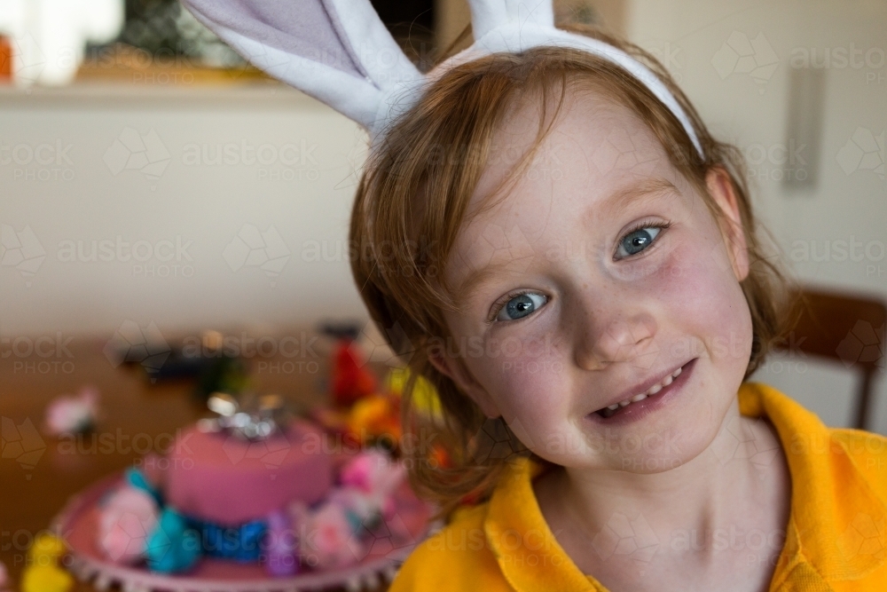 young girl wearing rabbit ears - Australian Stock Image
