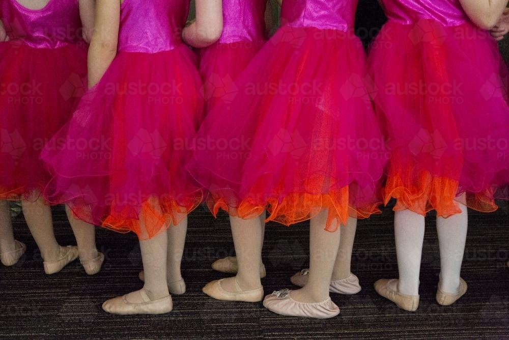 Young girls dressed in pink ready to perform at a ballet concert - Australian Stock Image