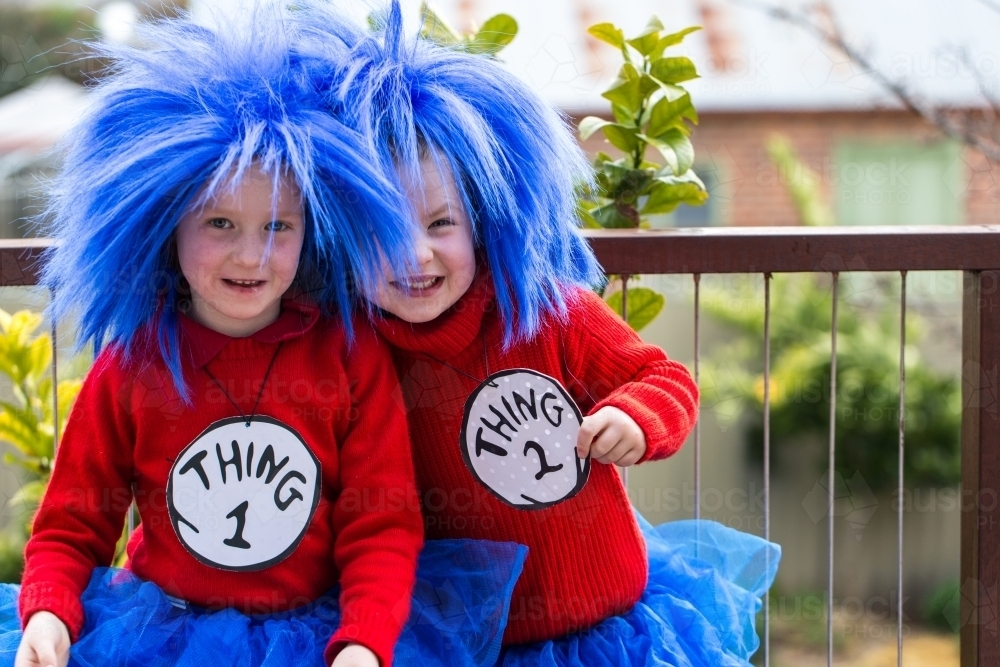 young girls dressed up as book characters Thing One and Thing Two for book week parade - Australian Stock Image