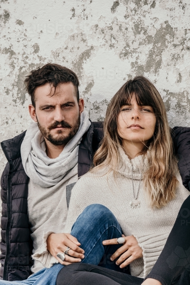 Young hipster couple pose for the camera. - Australian Stock Image