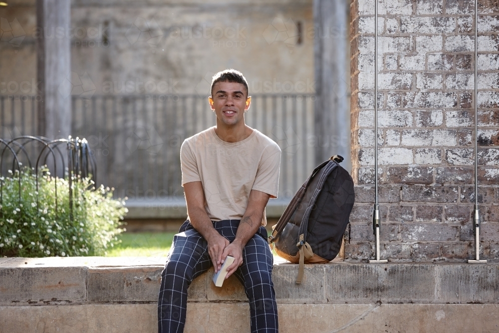 Young Indigenous Australian man enjoying time outdoors - Australian Stock Image