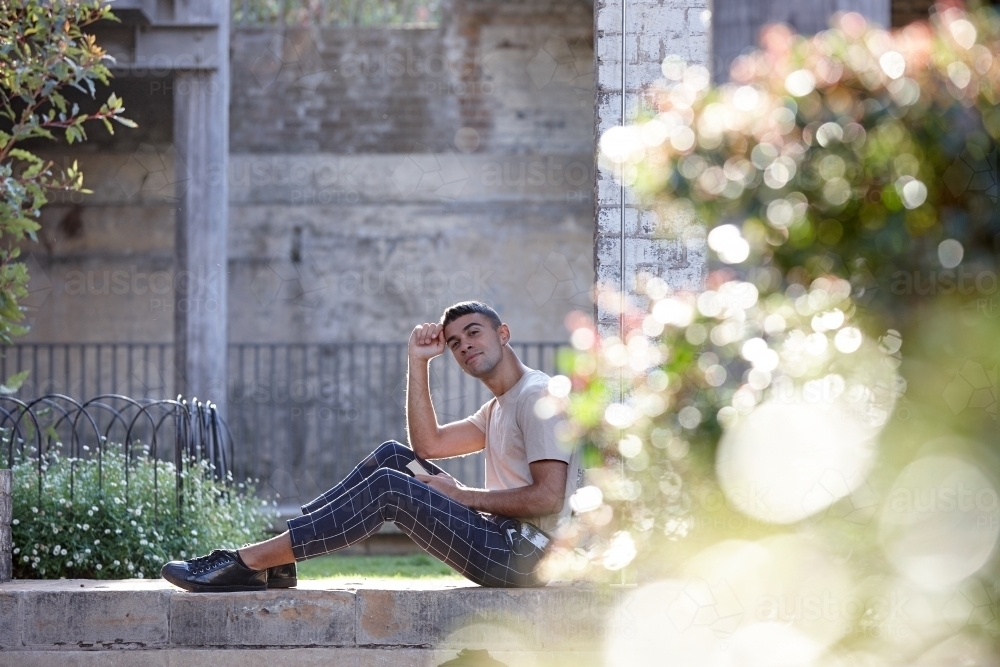 Young Indigenous Australian man enjoying time outdoors - Australian Stock Image