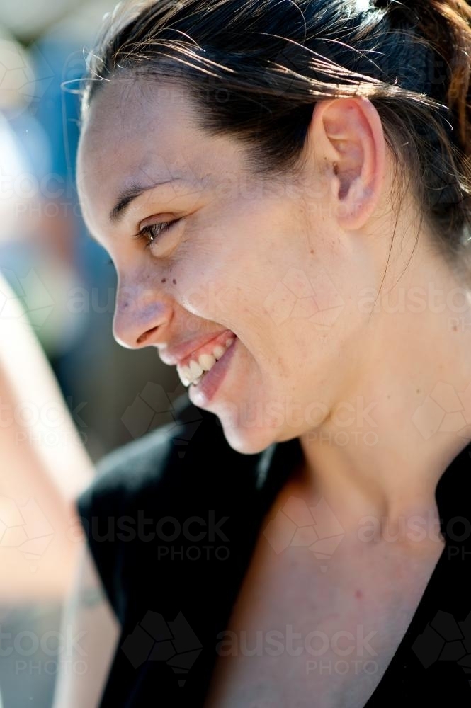 Young Indigenous Australian Woman in Black Dress - Australian Stock Image
