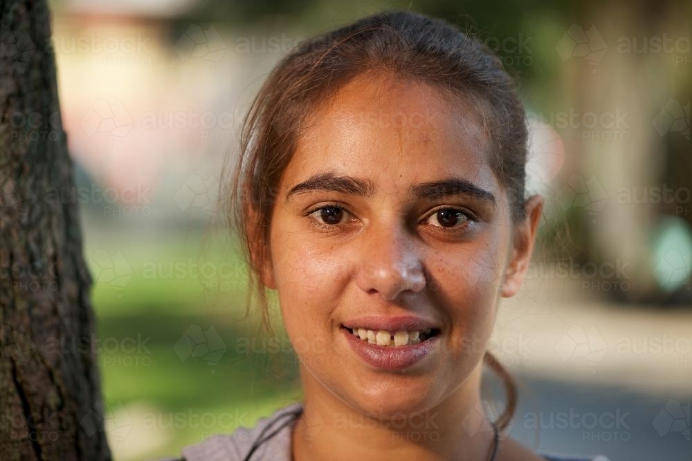 Young Indigenous Australian Woman Outdoors - Australian Stock Image