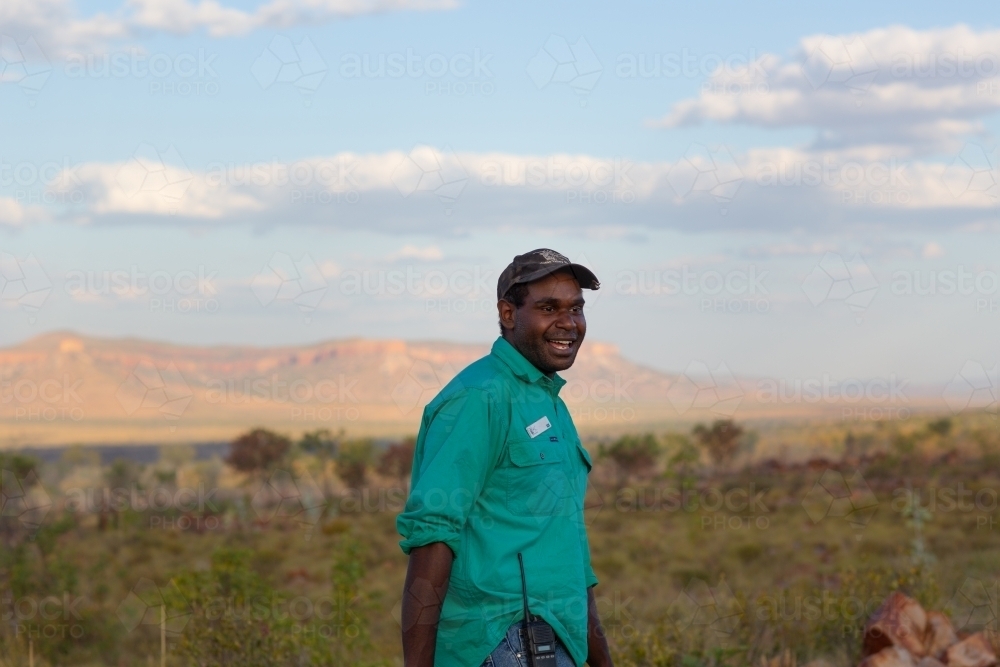 young indigenous man in the kimberley landscape - Australian Stock Image