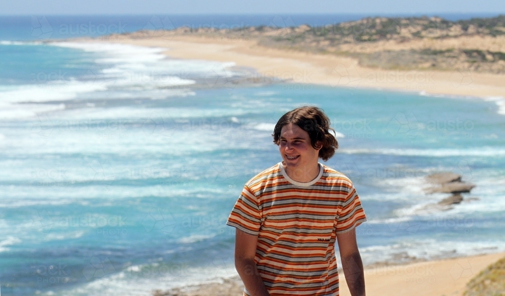 Young man at the beach - Australian Stock Image