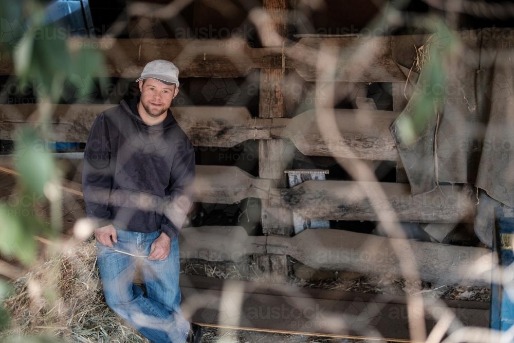 Young Man in a Farm Shed - Australian Stock Image