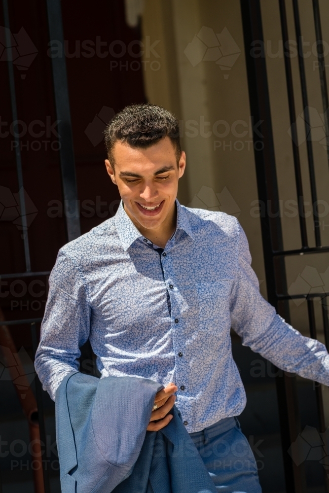 young man in floral shirt - Australian Stock Image