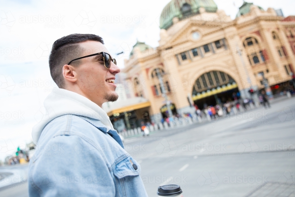 Young Man Walking in Melbourne - Australian Stock Image