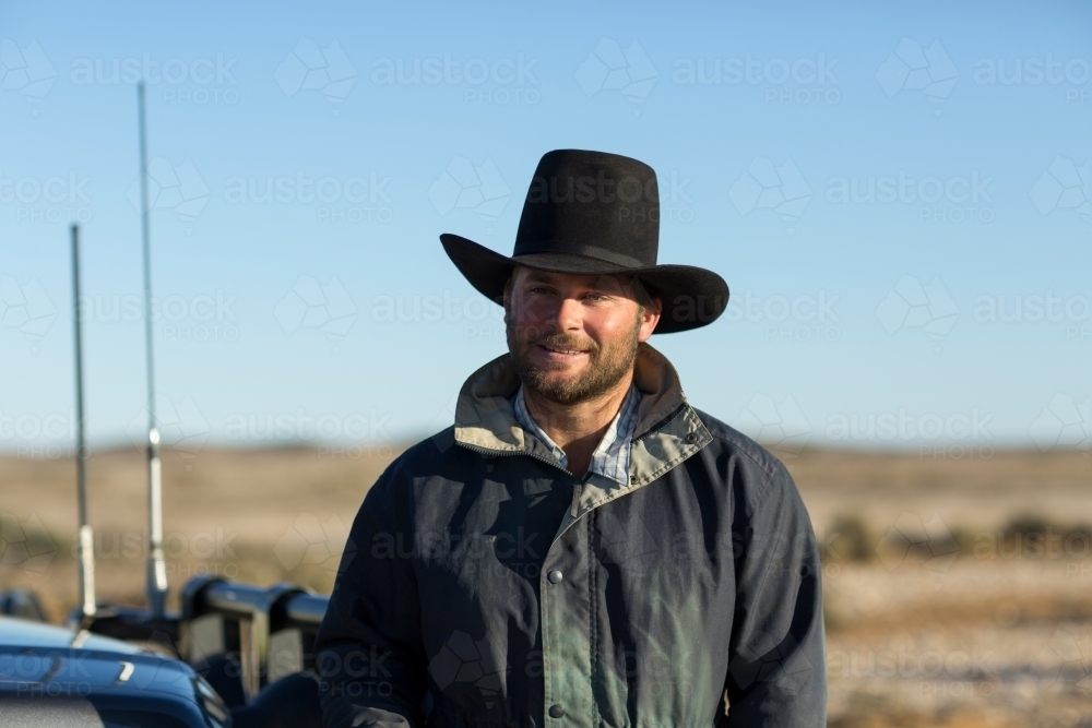 Young man wearing cowboy hat in the outback - Australian Stock Image