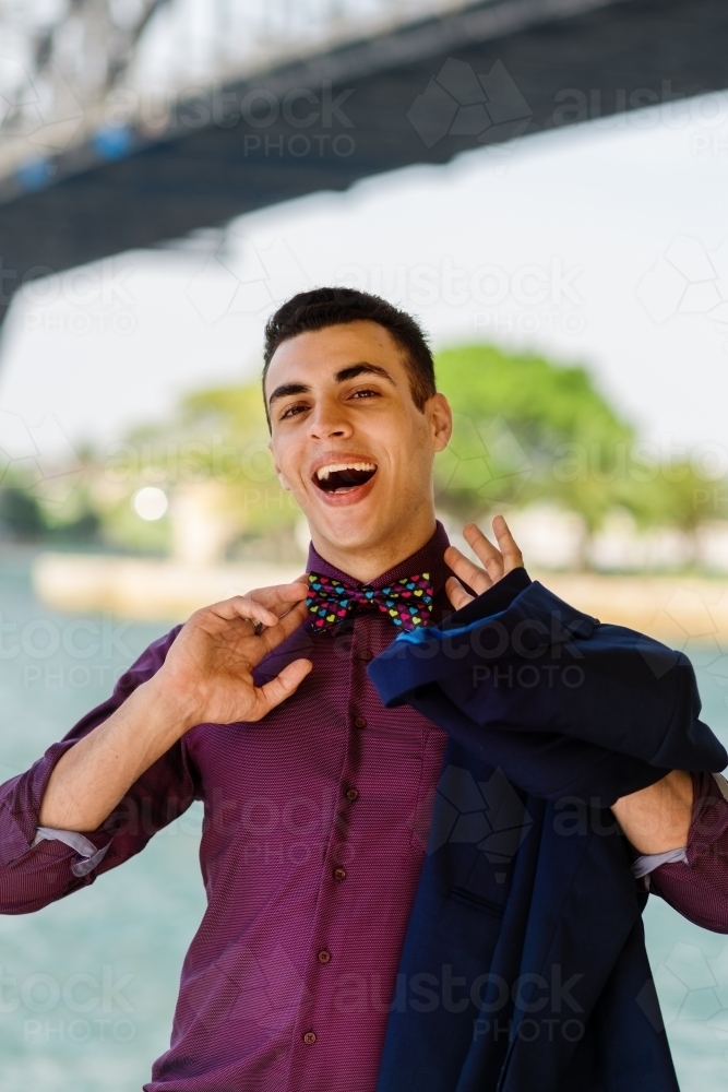 young man wearing fun bow tie - Australian Stock Image